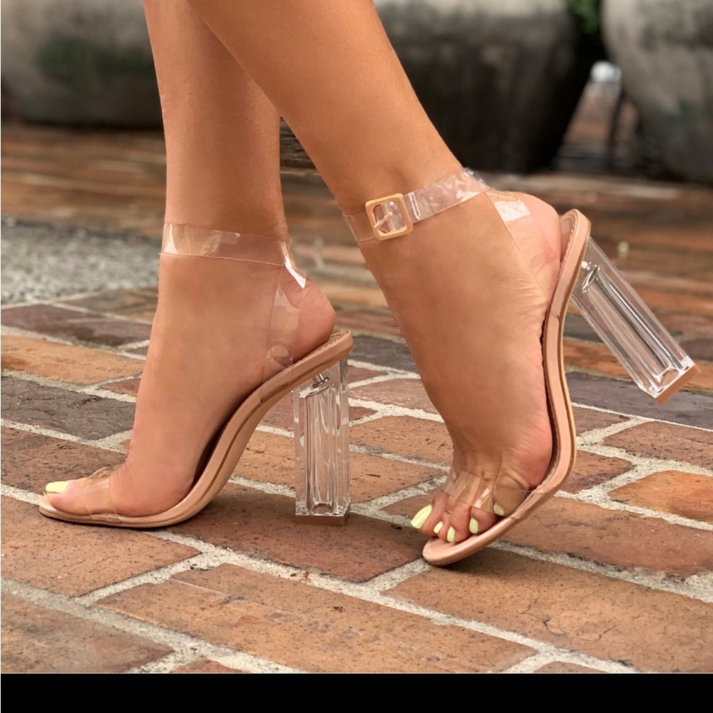 Glass slipper transparent block heel sandals.